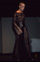 Terry Seiler in  lace and velvet gown with a patent leather corset 